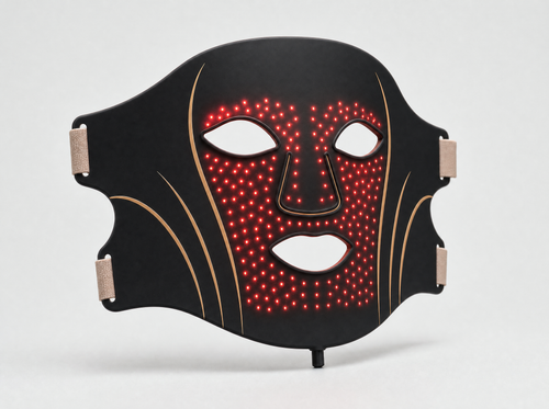 Le masque LED ONDESSA noir mat, vu de trois quarts, LED rouges allumées
